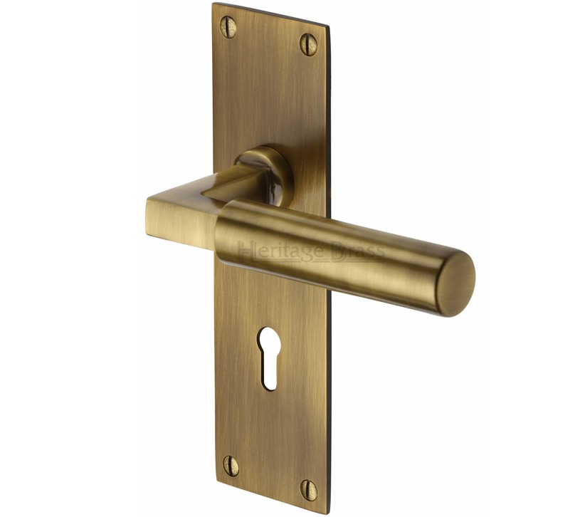 Heritage Brass Bauhaus Low Profile Door Handles On Backplate, Antique Brass - (Sold In Pairs)