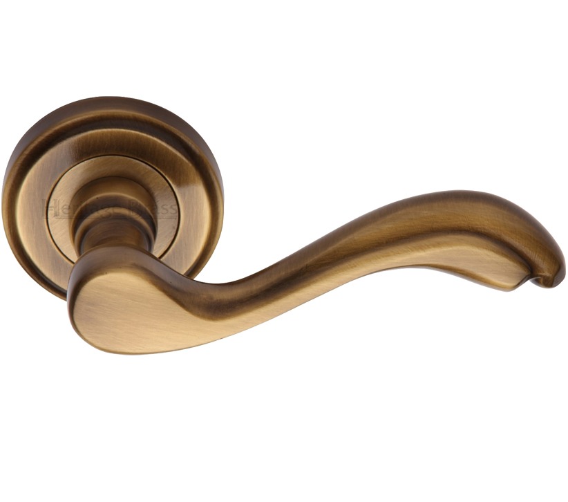 Heritage Brass Lisboa Antique Brass Door Handles On Round Rose