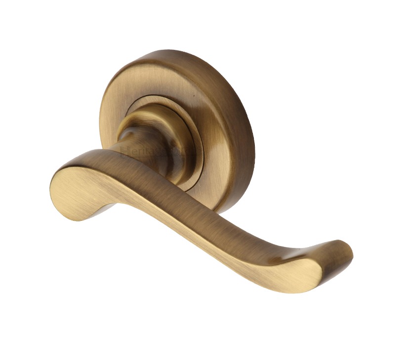 Heritage Brass Bedford Antique Brass Door Handles On Round Rose (Sold In Pairs)