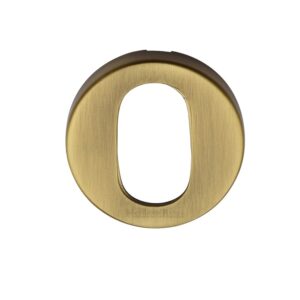 Heritage Brass Oval Key Escutcheon, Antique Brass