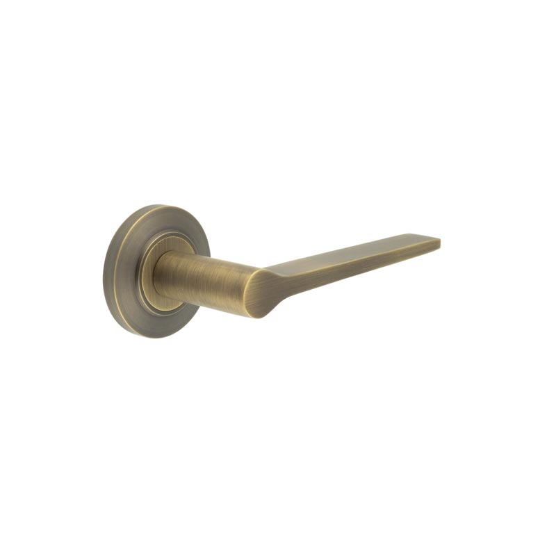 Knightsbridge Door Handle on Chamfered Rose Antique Brass