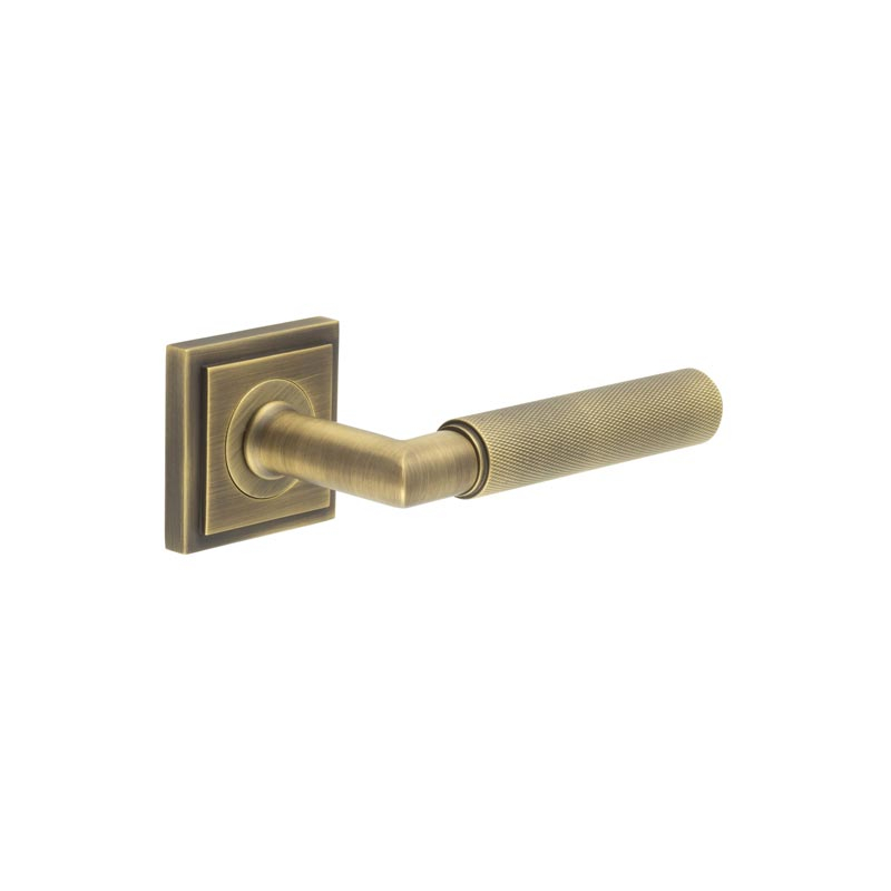 Piccadilly Door Handle on Stepped Square Rose Antique Brass